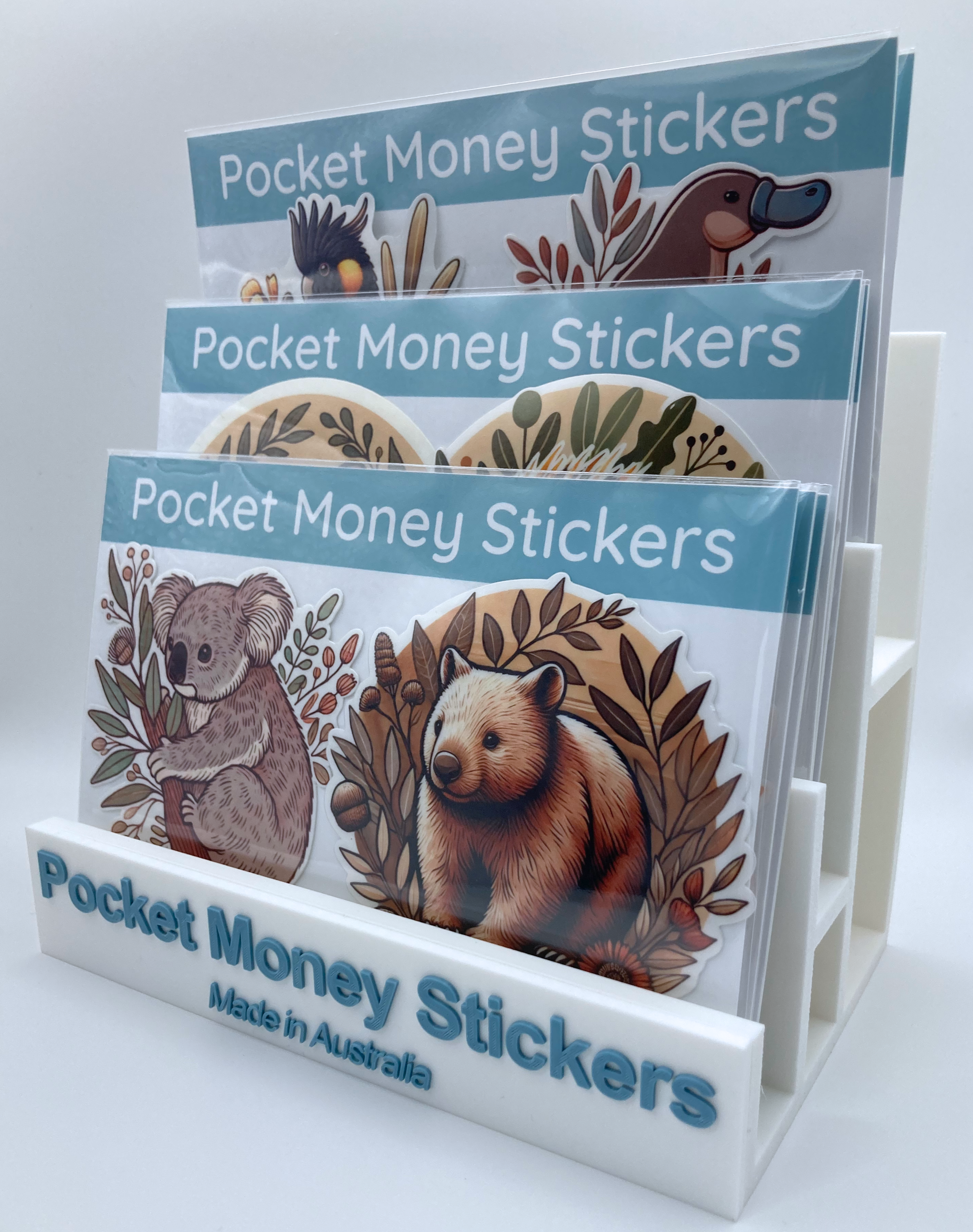 two sticker pack on a white sticker display stand
